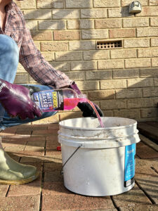 Cleaning exterior walls with Diggers Waterbased Degreaser