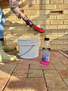 Cleaning exterior walls with Diggers Waterbased Degreaser