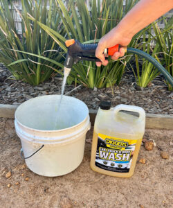 Fill bucket with DIGGERS™ Car, Truck & Boat Wash and water