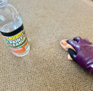 Paint spills being removed from carpet simpe