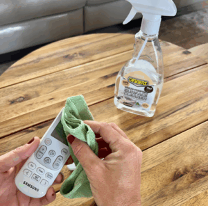 Keeping tv remote Clean and Germ-Free using DIGGERS Multi-purpose surface cleaner