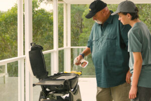 Merv Hughes using BBQ Cleaner