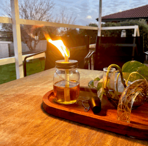 Lit DIY Outdoor Oil Lamps with Citronella Oil